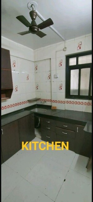 Kitchen in 2 BHK Apartment at Mayfair Complex, Camp – for Sale
