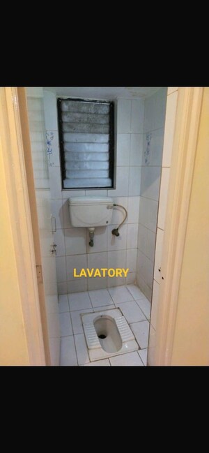 Bathroom in 2 BHK Apartment at Mayfair Complex, Camp – for Sale