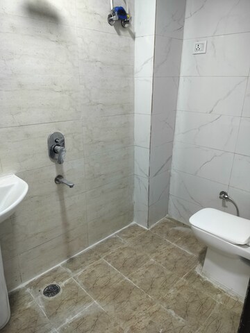Bathroom in 3 BHK Builder Floor at Palm sunrise, Shahpur Bamheta – for Sale