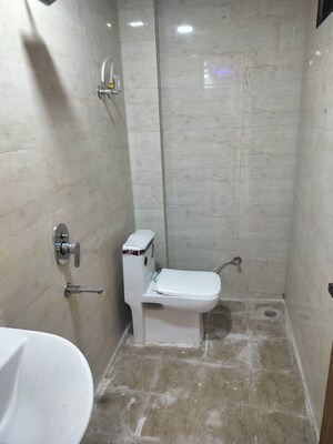 Bathroom in 3 BHK Builder Floor at Palm sunrise, Shahpur Bamheta – for Sale