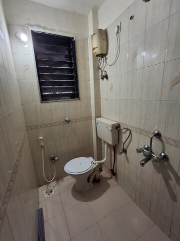 Bathroom in 1 BHK Apartment at Mukta Mahek, Kandivali East – for Rent