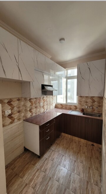 Kitchen in 3 BHK Apartment at Amrapali Golf Homes, Sector 4 Greater Noida – for Rent