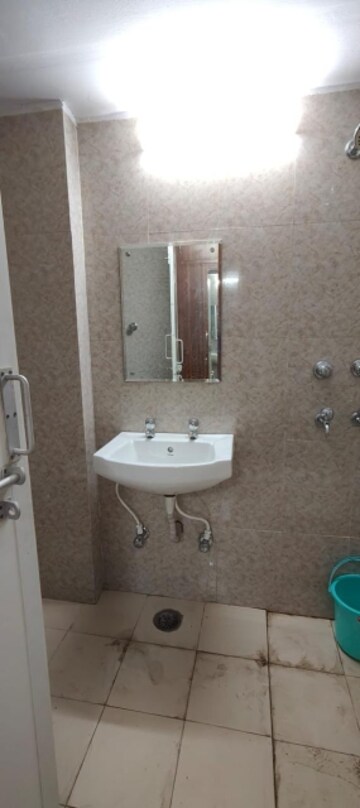 Bathroom in 4 BHK Apartment at Sector 11 Dwarka – for Rent