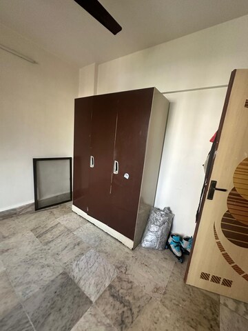 Living Room in 2 BHK Apartment at Orlem Grace Apartments, Malad West – for Rent