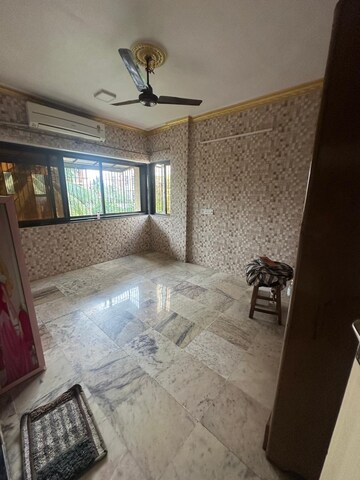 Bedroom in 2 BHK Apartment at Orlem Grace Apartments, Malad West – for Rent