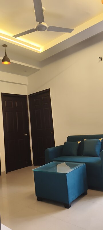 Living Room in 1.5 BHK Apartment at Prateek Grand Carnesia, Siddharth Vihar – for Rent
