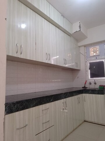 Kitchen in 3 BHK Apartment at DLF Regal Gardens, Sector 90 – for Rent