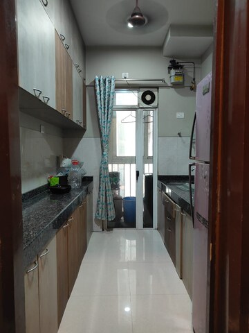 Kitchen in 4 BHK Apartment at Rishita Manhattan, Gomti Nagar – for Rent