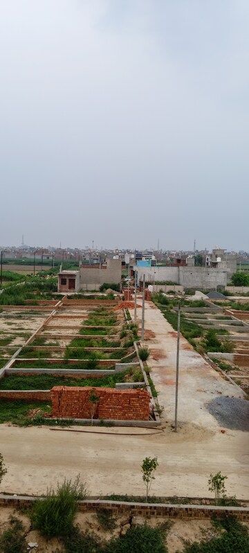  Plot – Exterior View View at Defence Empire, Surajpur - for Sale