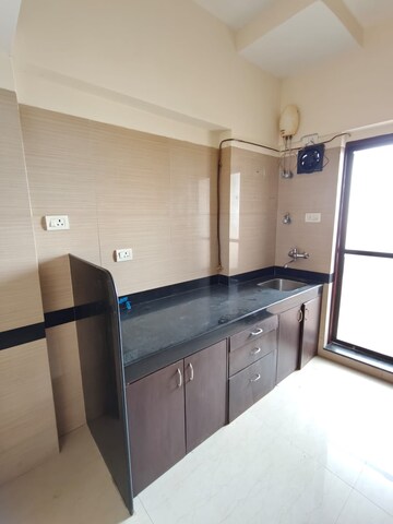 Kitchen in 2 BHK Apartment at K Raheja Heights, Malad East – for Rent