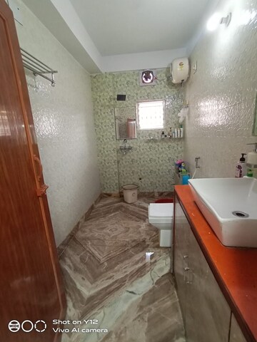 Bathroom in 4 BHK Builder Floor at Kudghat – for Sale