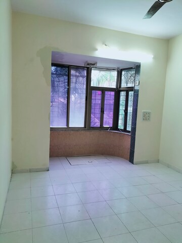 Room in 2 BHK Apartment at Arpan Darpan CHS, Goregaon East – for Rent