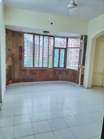 Room in 2 BHK Apartment at Arpan Darpan CHS, Goregaon East – for Rent