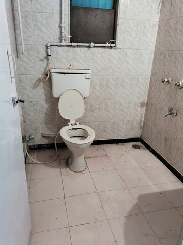 Bathroom in 2 BHK Apartment at Arpan Darpan CHS, Goregaon East – for Rent