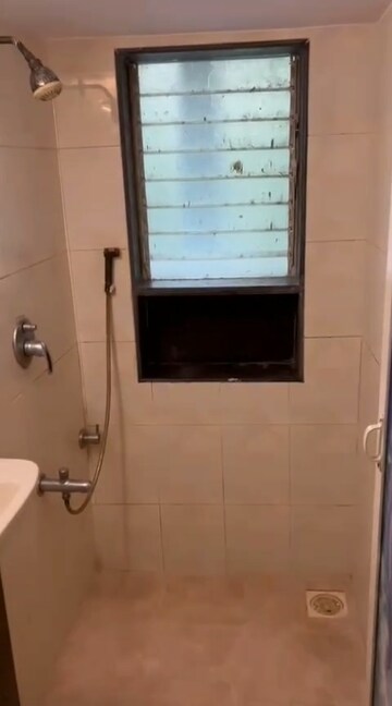 Bathroom in 1 BHK Apartment at Cosmos CHS, Andheri West – for Rent