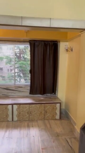 Living Room in 1 BHK Apartment at Cosmos CHS, Andheri West – for Rent