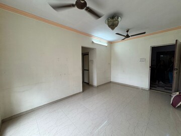 Living Room in 1 BHK Apartment at Bhoomi Classic, Malad West – for Rent