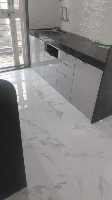 Kitchen in 3 BHK Apartment at Border Roads CHS Phase 1, Dhanori – for Rent