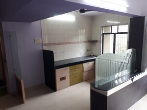 Kitchen in 2 BHK Apartment at Himgiri Lokupvan Phase II CHS Ltd, Vasant Vihar – for Sale