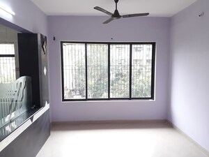 Room in 2 BHK Apartment at Himgiri Lokupvan Phase II CHS Ltd, Vasant Vihar – for Sale