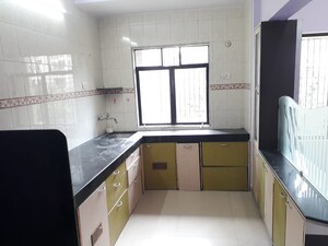 Kitchen in 2 BHK Apartment at Himgiri Lokupvan Phase II CHS Ltd, Vasant Vihar – for Sale