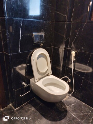 Bathroom in 4 BHK Apartment at Vasant Vihar – for Rent