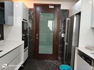 Kitchen in 4 BHK Apartment at Vasant Vihar – for Rent