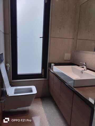 Bathroom in 4 BHK Apartment at Vasant Vihar – for Rent