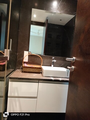 Bathroom in 4 BHK Apartment at Vasant Vihar – for Rent