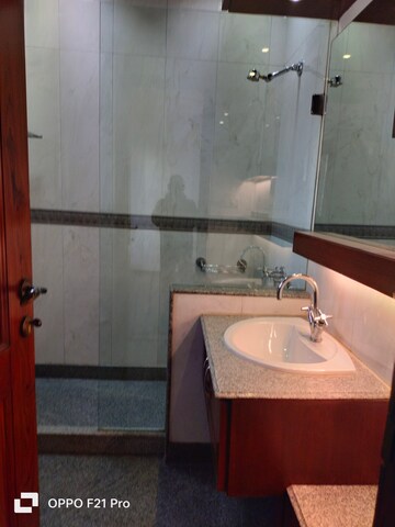 Bathroom in 4 BHK Apartment at Vasant Vihar – for Rent