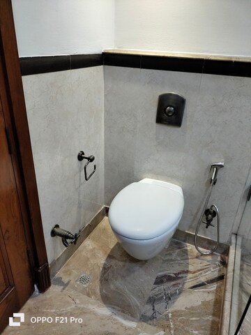 Bathroom in 4 BHK Apartment at Vasant Vihar – for Rent