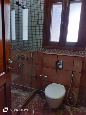 Bathroom in 4 BHK Apartment at Vasant Vihar – for Rent