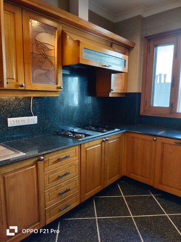 Kitchen in 4 BHK Apartment at Vasant Vihar – for Rent