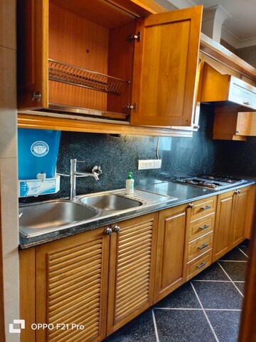 Kitchen in 4 BHK Apartment at Vasant Vihar – for Rent