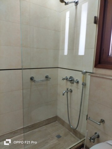 Bathroom in 4 BHK Apartment at Vasant Vihar – for Rent