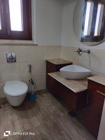 Bathroom in 4 BHK Apartment at Vasant Vihar – for Rent