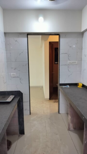 Kitchen in 2 BHK Apartment at QN Greens Phase 2, Taloja – for Rent