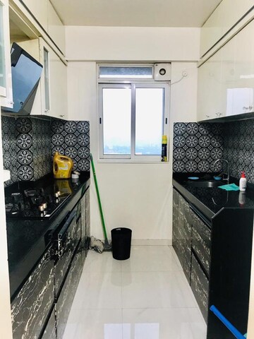 Kitchen in 1 BHK Apartment at Lodha Amara, Kolshet Road – for Rent
