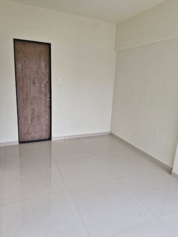 Room in 2 BHK Apartment at Gulmohar CHS Goregaon, Goregaon West – for Rent
