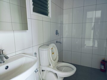 Bathroom in Studio Apartment at Godrej Royale Woods, Devanahalli – for Rent