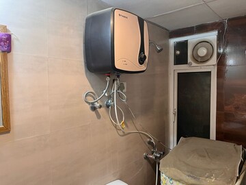 Bathroom in 2 BHK Apartment at Amrapali Golf Homes, Sector 4 Greater Noida – for Rent