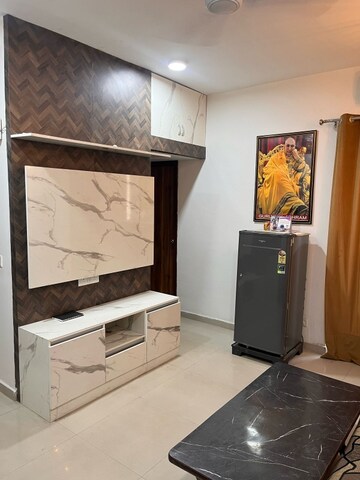 Living Room in 2 BHK Apartment at Amrapali Golf Homes, Sector 4 Greater Noida – for Rent