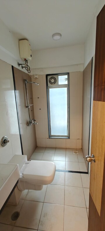 Bathroom in 2 BHK Apartment at Millennium Court, Andheri West – for Rent