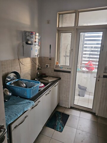 Kitchen in 2 BHK Apartment at Supertech The Romano, Sector 118 – for Rent