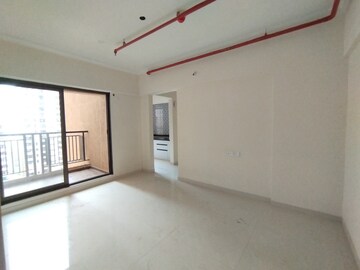 Living Room in 1 BHK Apartment at Raunak City Sector 4, Kalyan West – for Rent