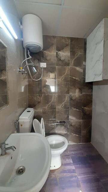 Bathroom in 2 BHK Apartment at Pivotal Riddhi Siddhi, Sector 99 – for Rent