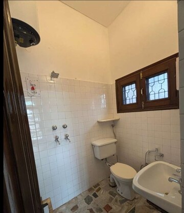 Bathroom in 3 BHK Builder Floor at Sector 35 – for Rent