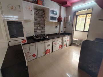 Kitchen in 2 BHK Apartment at Shreenathji Tower, Kalyan West – for Rent