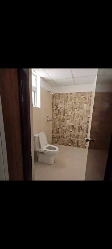 Bathroom in 3 BHK Apartment at Urban Axis Urban Woods, Sushant Golf City – for Rent