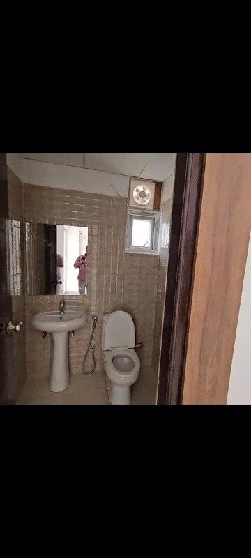 Bathroom in 3 BHK Apartment at Urban Axis Urban Woods, Sushant Golf City – for Rent